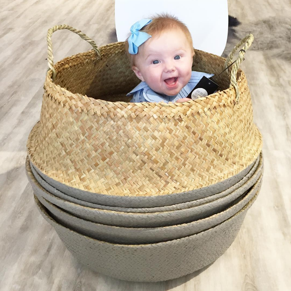 Peekaboo with Caroline in our Seagrass Baskets.