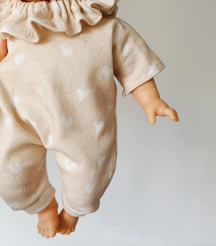 Image of Beige Romper With Hearts