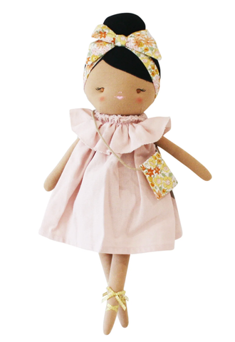 Image of Doll with a pink dress and floral headband Alimrose
