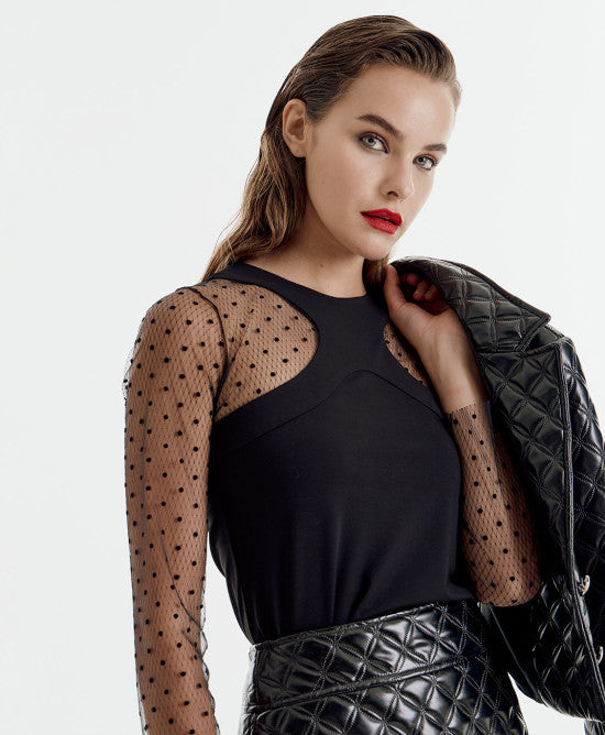 Blouse with mesh polka-dotted sleeves