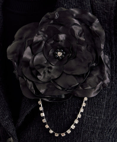 Flower brooch with rhinestone chain