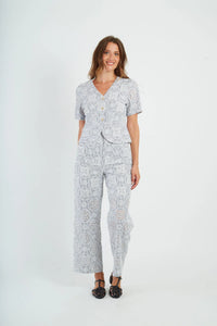 BERTHEA straight-leg trousers with eyelet embroidery