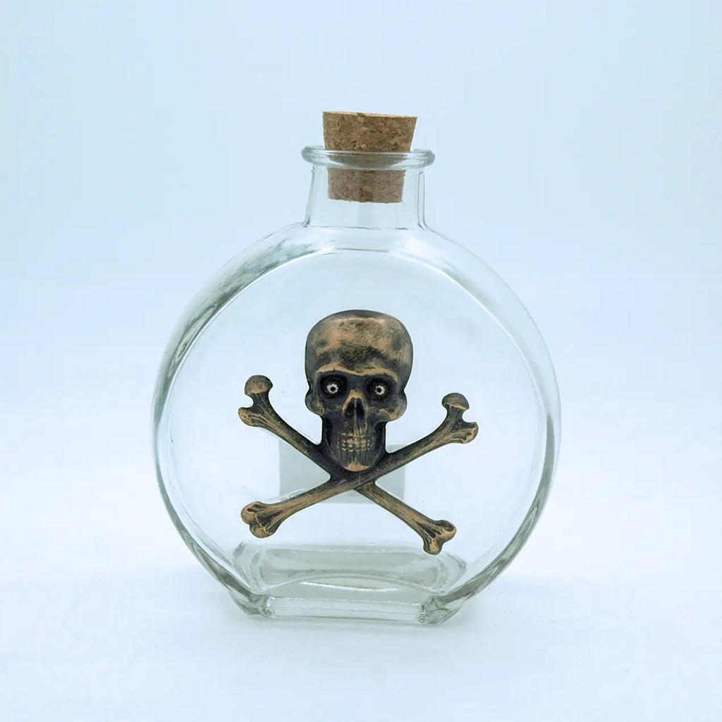 Vintage holy water bottle w/ skull